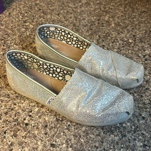 Tom’s sparkly flats